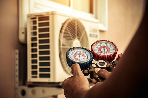 Professional Ac Installation technician working in Harper, KS